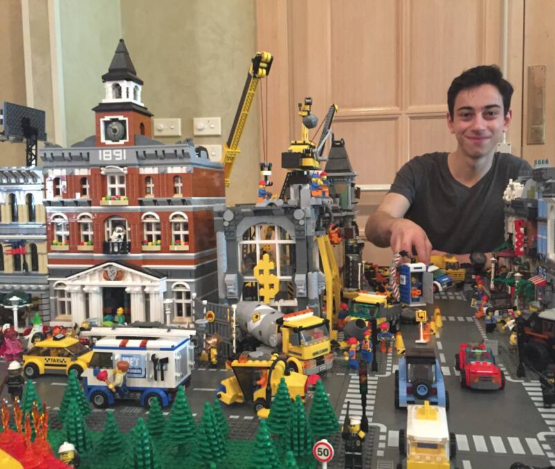 Patience is key: Isaac Cini of Launceston adds the final touches to his Lego city. More than 4000 people are expected to check out Brixhibition over the weekend. Pictures: Tarlia Jordan 