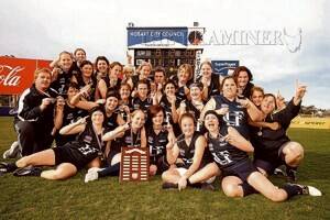 Launceston celebrates winning its first state premiership after defeating Clarence by 10 points in the Tasmanian Women's AFL competition yesterday.