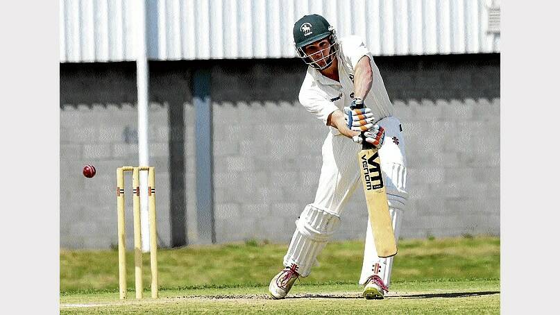 South Launceston's Christ Hayes hits out with the bat in the match against George Town. Picture: Neil Richardson