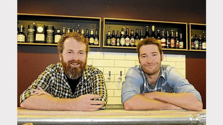 Saint John Craft Beer's Luke Dempsey and Ryan Campling in the bar. Picture: PAUL SCAMBLER