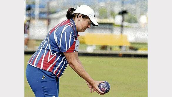 Latrobe's Ruth Sims lines up her shot in her fours contest against Kings Meadows on Saturday at the state bowls titles. Picture: GEOFF ROBSON