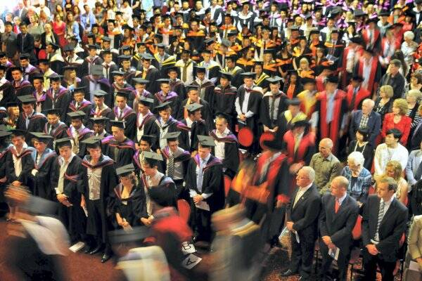 The academic procession enters the Albert Hall in Launceston yesterday.  Picture: SCOTT GELSTON