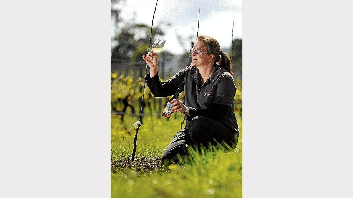 Holm Oak Vineyard owner Rebecca Duffy with a glass of Small Players cider. Picture: PHILLIP BIGGS