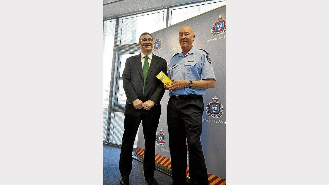 Bushfire and Natural Hazards Co-operative Research Council boss Richard Thornton and Tasmania Fire Service chief Mike Brown.