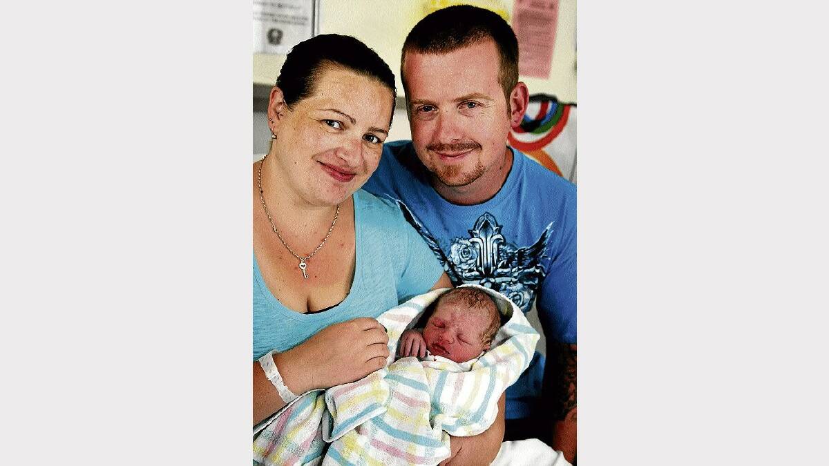 Emma and Simon Shuker, of Beaconsfield, with baby Jasper, the first baby born on New Year's Day at the Launceston General Hospital. Picture: GEOFF ROBSON