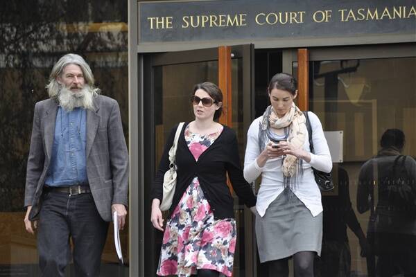 Susan Blyth Neill-Fraser's former husband Brett Meeker and her daughters Emma Mills and Sarah Bowles outside the Supreme Court during the trial in September last year.