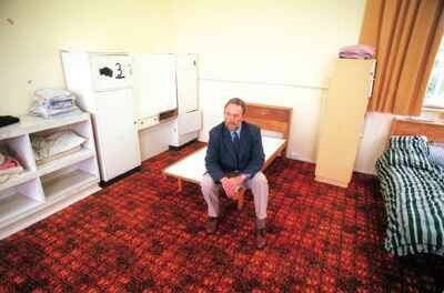 'AUSTERE': Ashley Detention Centre manager Neil Warnock in one of the dormitories. Picture: EDDIE SAFARIK