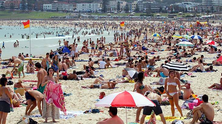 Hitting the beach … crowds on Bondi Beach.