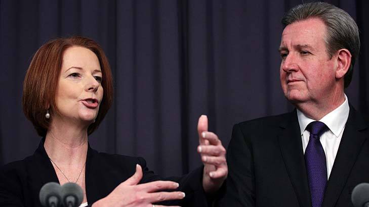 Hard choices … Julia Gillard and Barry O'Farrell on Thursday.