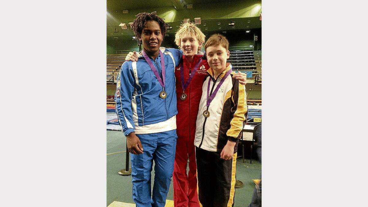 Tasmanian trio Makonnen Brown, of Launceston, Matthew French, of Kingborough, and Apex club member Patrick Schluter after competing in Brisbane at the weekend.