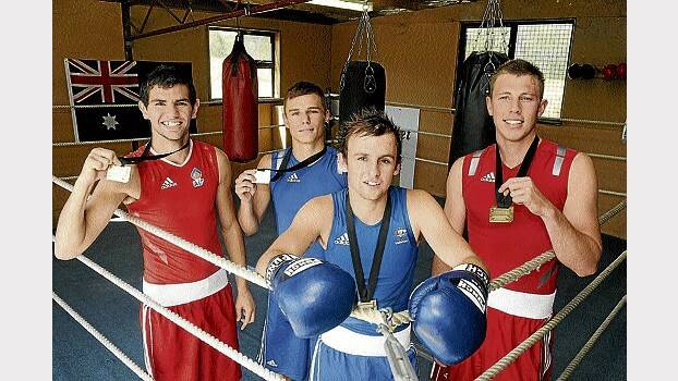 Luke Woods, Nick Cooney, Jackson Woods and Dylan Hardy brought home three golds and a silver from last week's national boxing championships. Picture: PAUL SCAMBLER