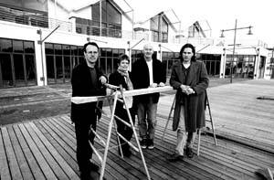 ON THE WATERFRONT: Stefan Hunziker, Judy and Stephen Johnson, and Fergus Carmichael on deck at the Old Sea Port development. Picture: PAUL SCAMBLER
