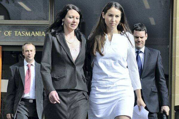   Neill-Fraser's daughters Emma Meeker and Sarah Bowles leave the Supreme Court in Hobart yesterday. Picture: LORETTA JOHNSTON