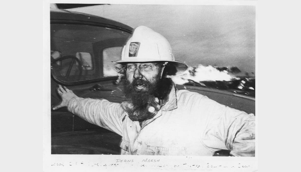 A CFA firefighter pauses for breath during the Ash Wednesday fires in 1983. Photo: FAIRFAX ARCHIVES