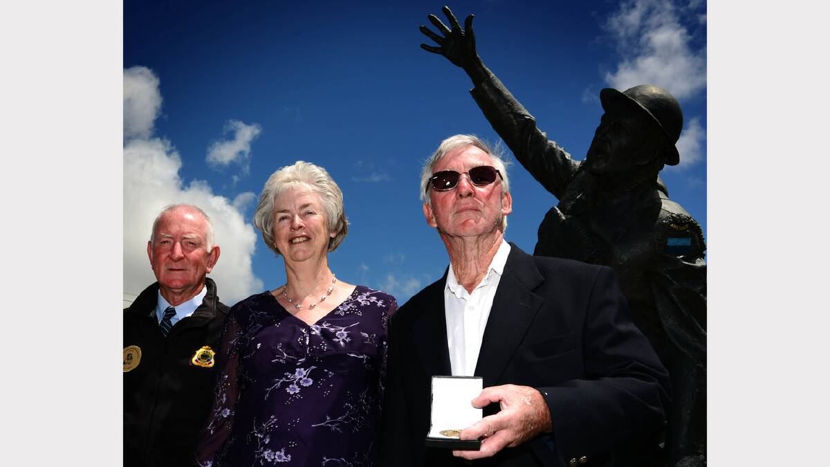 Northern Midlands RSL sub-branch president Geoff Leitch, Harry Murray's great niece Anne Batalibasi and Evandale Anzac Committee member Stephen Baldock get together for the launch of the medal at the Harry Murray statue at Evandale. Picture: Scott Gelston
