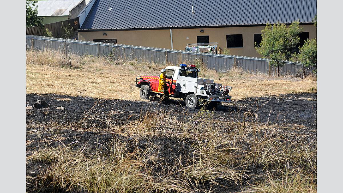 Fire crews and Riverside Retirement Village residents battled a grass and scrub fire at Riverside. Picture: Geoff Robson