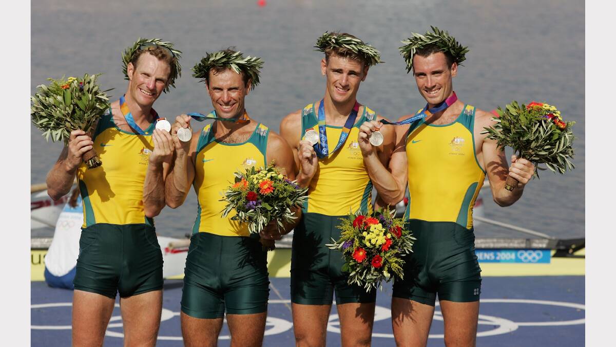 The silver medal winning team (L to R) Ben Cureton, Glen Loftus, Simon Burgess and Anthony Edwards of Australia during the medal ceremony for the men's lightweight four sculls at Athens, 2004.