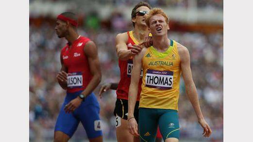 Australia's Tristan Thomas competes in the Men's 400m Hurdles at the Olympic Stadium.