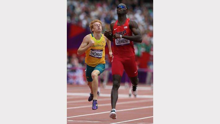 Australia's Tristan Thomas competes in the Men's 400m Hurdles at the Olympic Stadium. 