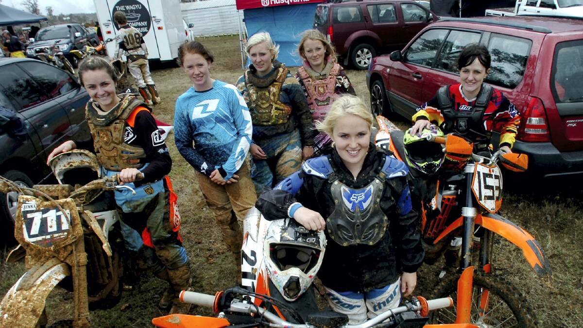 Jenna Lupo, of Legana, Morgan Wright, of Ulverstone, Shannan Logan, of Hobart, Abbie Clark, of Hobart, Sarah Knee, of Launceston (front), and Caitlin Viney, of Perth, are delighted that more women have taken up motocross.