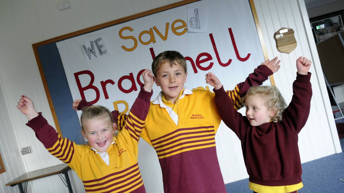 FLASHBACK: Bracknell Primary School pupils Hallie Schurring, William Tubb and Adele Roberts celebrate after hearing the school wouldn't be closed last year.  