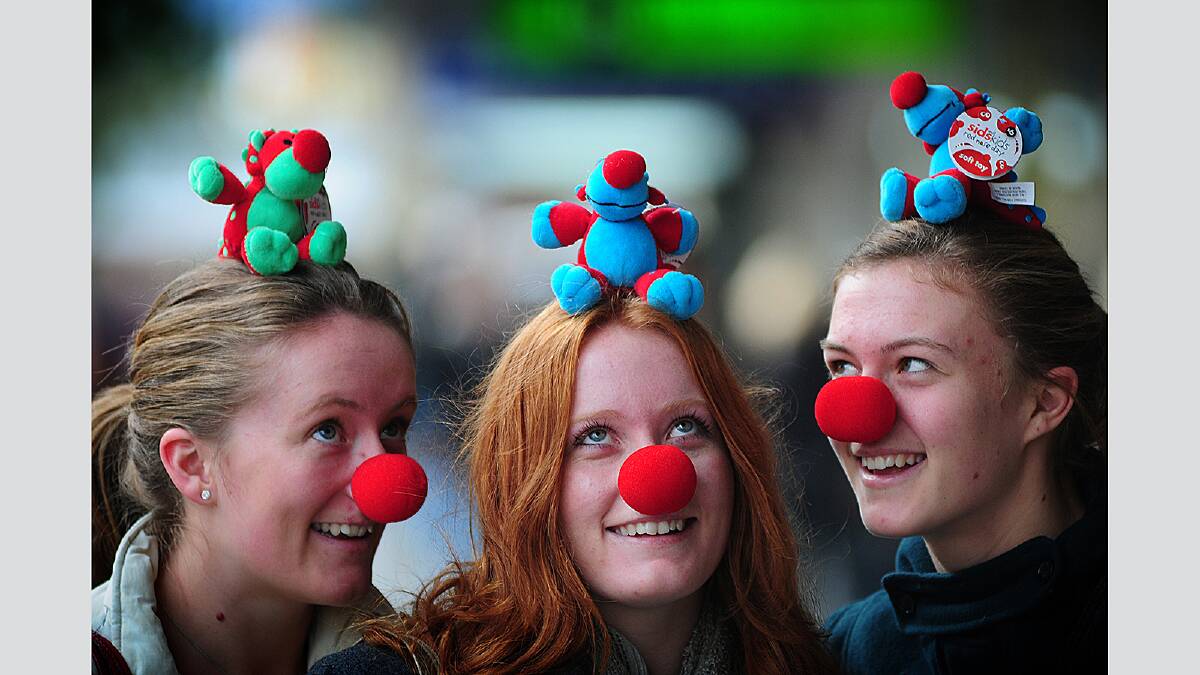 Friday June 29 2012  photo: Phillip Biggs   Red Nose Day in the Brisbane Street mall, Launceston: Alex, Meg and Lucy Dennis of Scottsdale