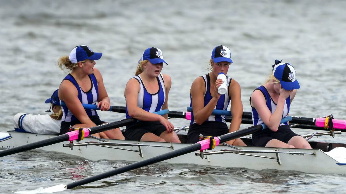 Launceston Church Grammar School's open girls' coxed four  of Georgia Patrikopoulos, Ruby Banner, Frances Roberts, Meg Thyne and Sarah Basset  catch their breath after yesterday's winning row. Picture: PHILLIP BIGGS.