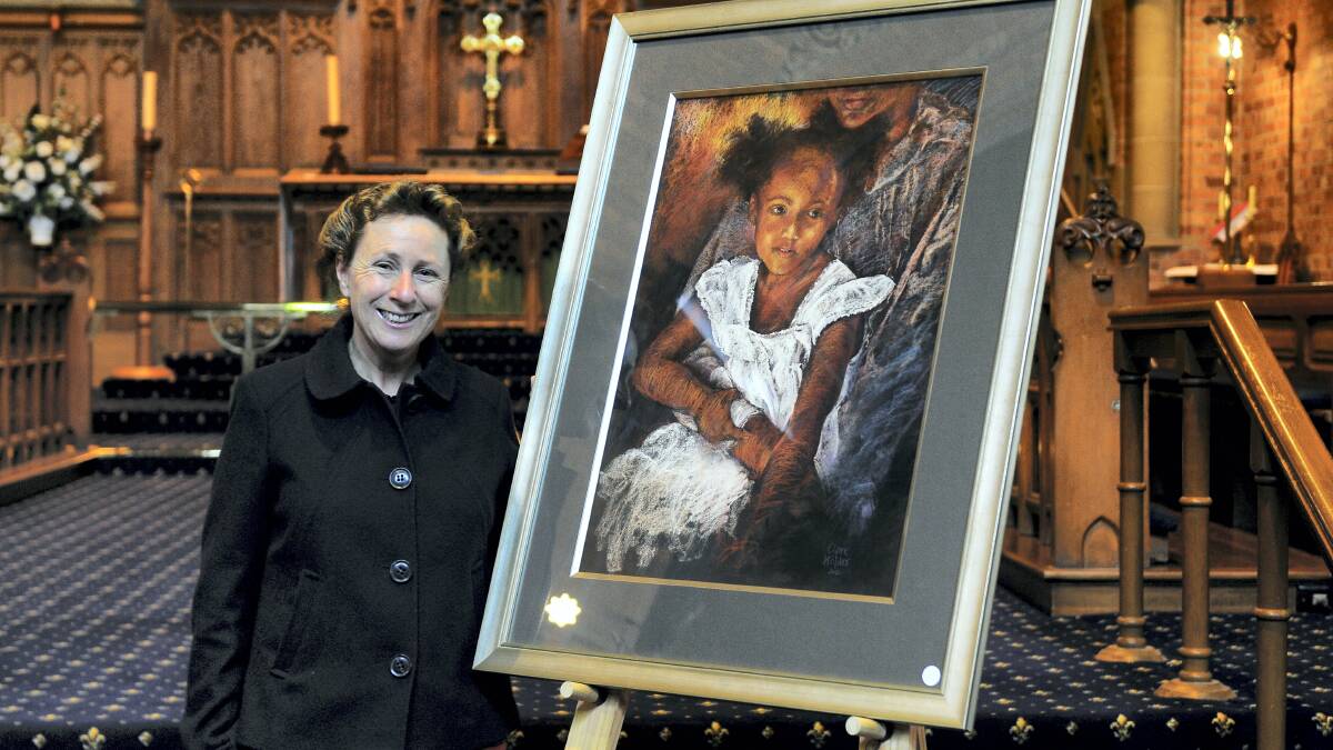 Clare Holder with her Launceston Art Society's 2012 Holy Trinity Celebrating Life winning entry, Girl in White. Picture: NEIL RICHARDSON