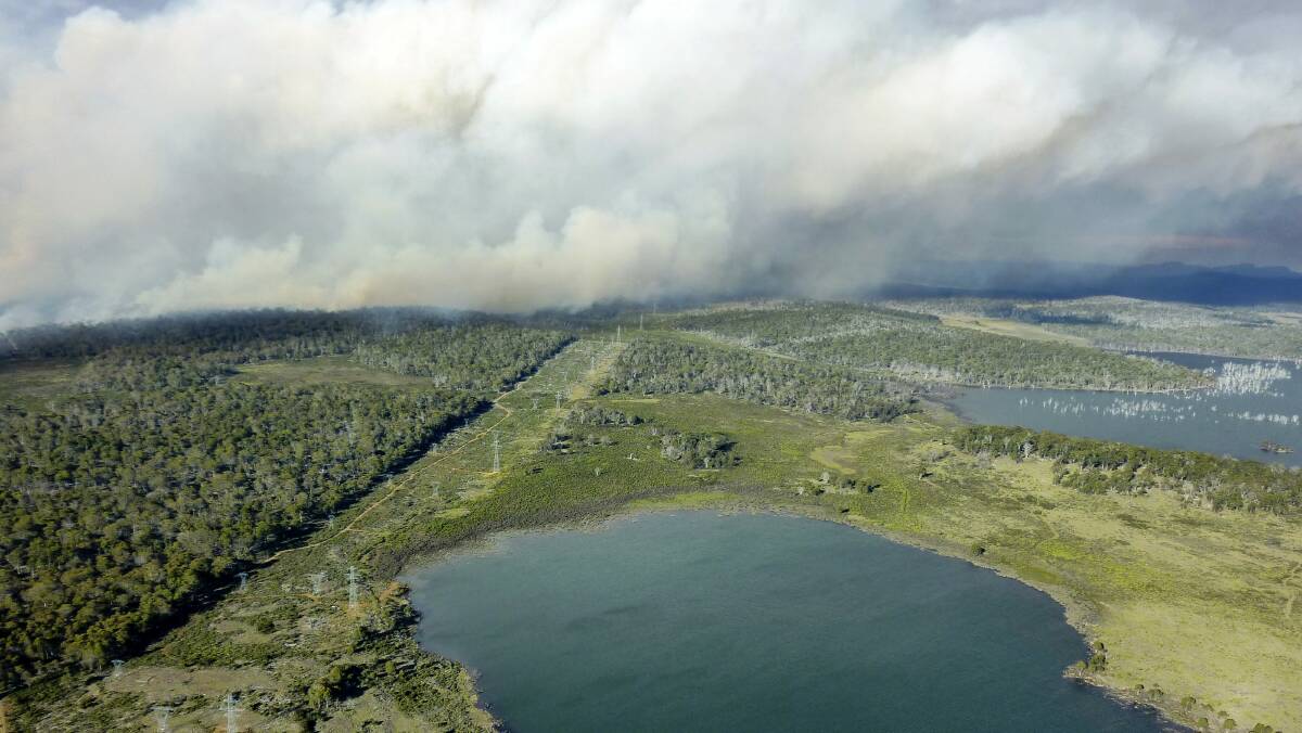 An aerial view of the fire burning near Poatina yesterday.