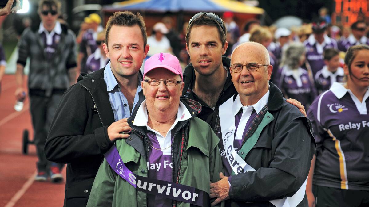 Pauline and Russell Watson, of Launceston, and their sons Wayne and Paul, of Perth, Western Australia, shrugged off the rain yesterday to take part in the Cancer Council's Relay for Life at the St Leonards Sports Centre. More than 2000 people took part in the Launceston event.