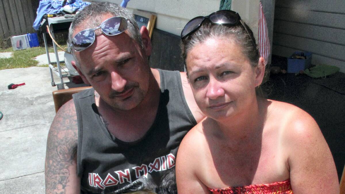 St Helens couple Dean and Rebecca Evans, who woke on Boxing Day to find their car burning in their backyard.
