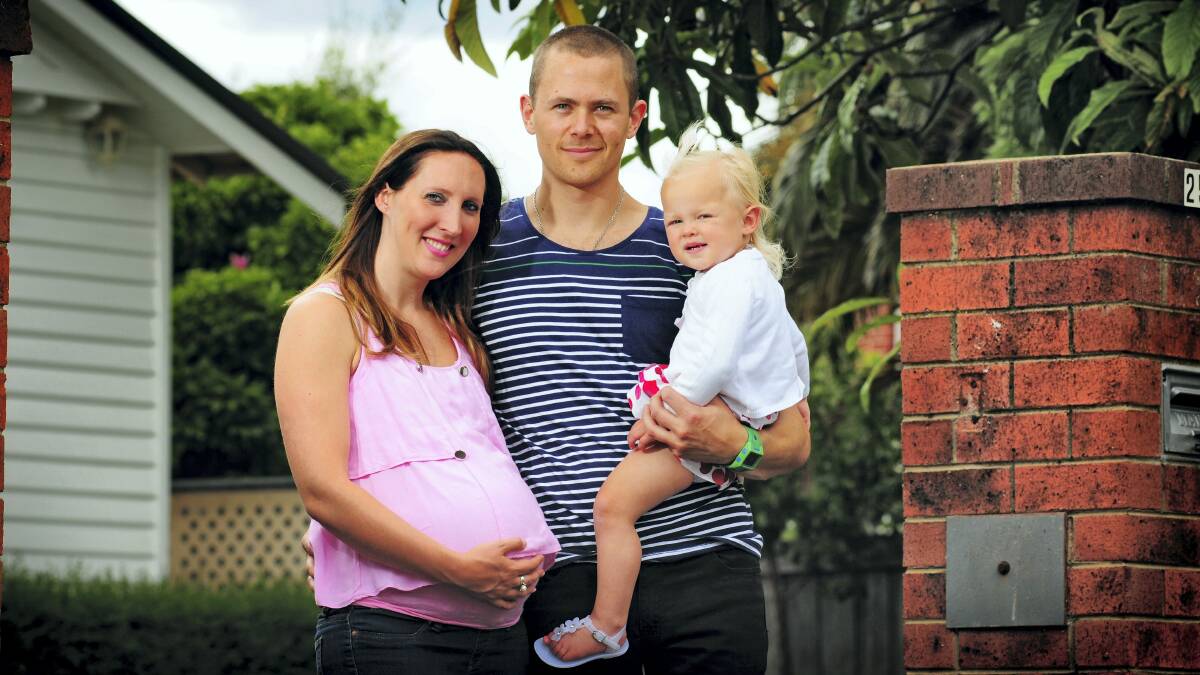 Adam and Claire Vos, of Newstead, with 21-month-old Anouk. Picture: PHILLILP BIGGS 