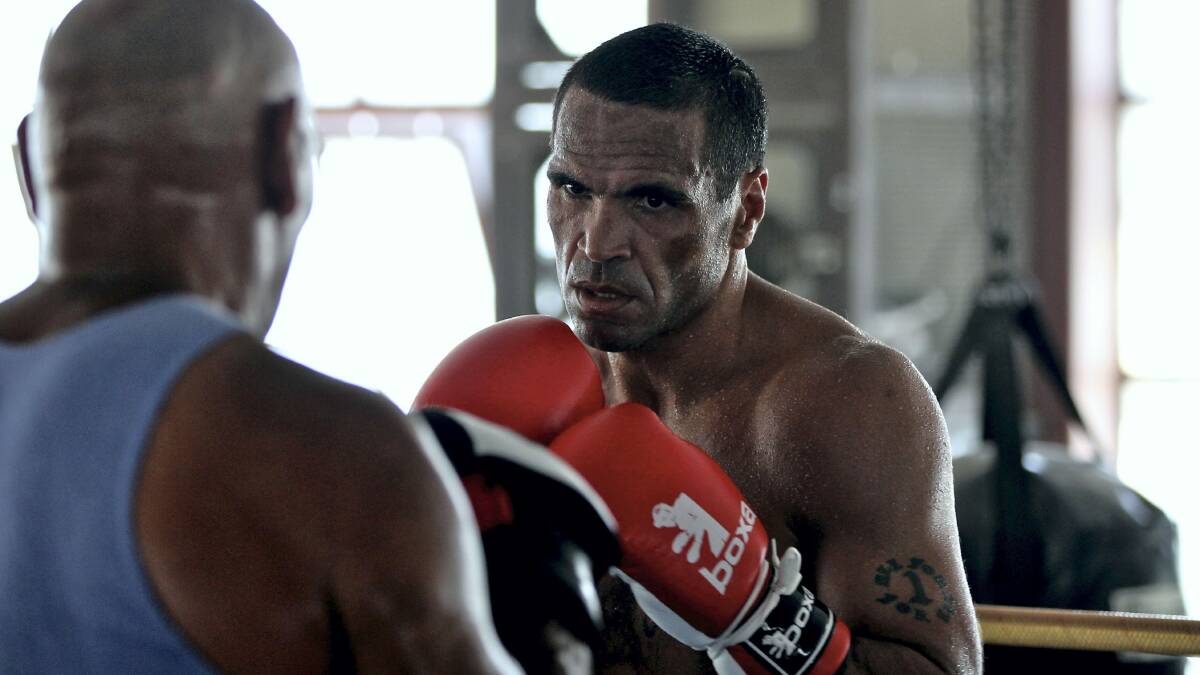 Anthony Mundine training in his father's gym yesterday.