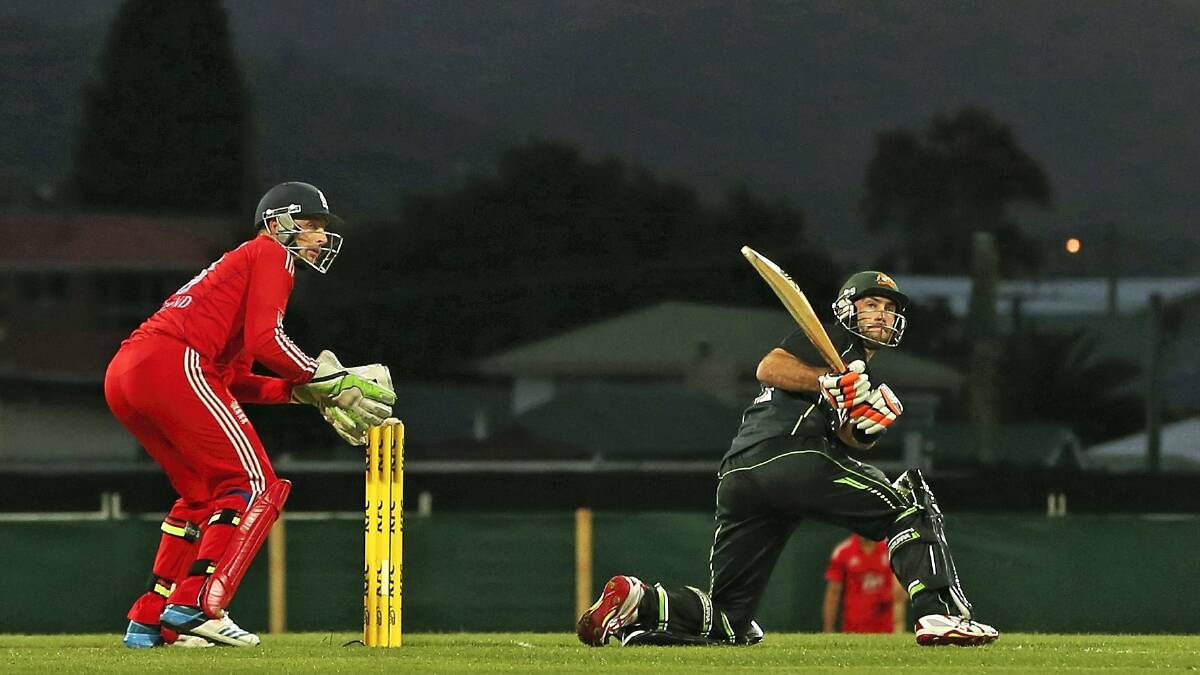 Glenn Maxwell, of Australia, reverse sweeps during game 1 of the International Twenty20 series against England  in Hobart yesterday. 