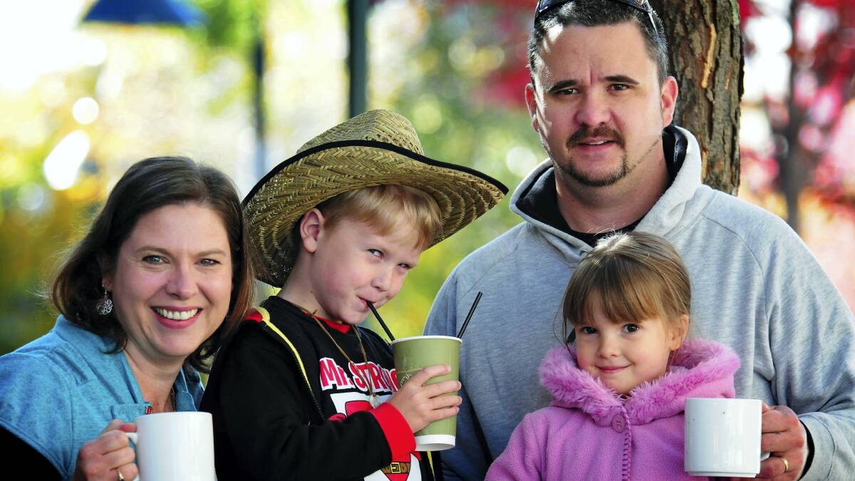 Donna and Dean Emery, of Hadspen, enjoy a Banjo's Bakery coffee while Luke, 7, and Gabrielle, 4, share a milkshake.   Picture: PHILLIP BIGGS
