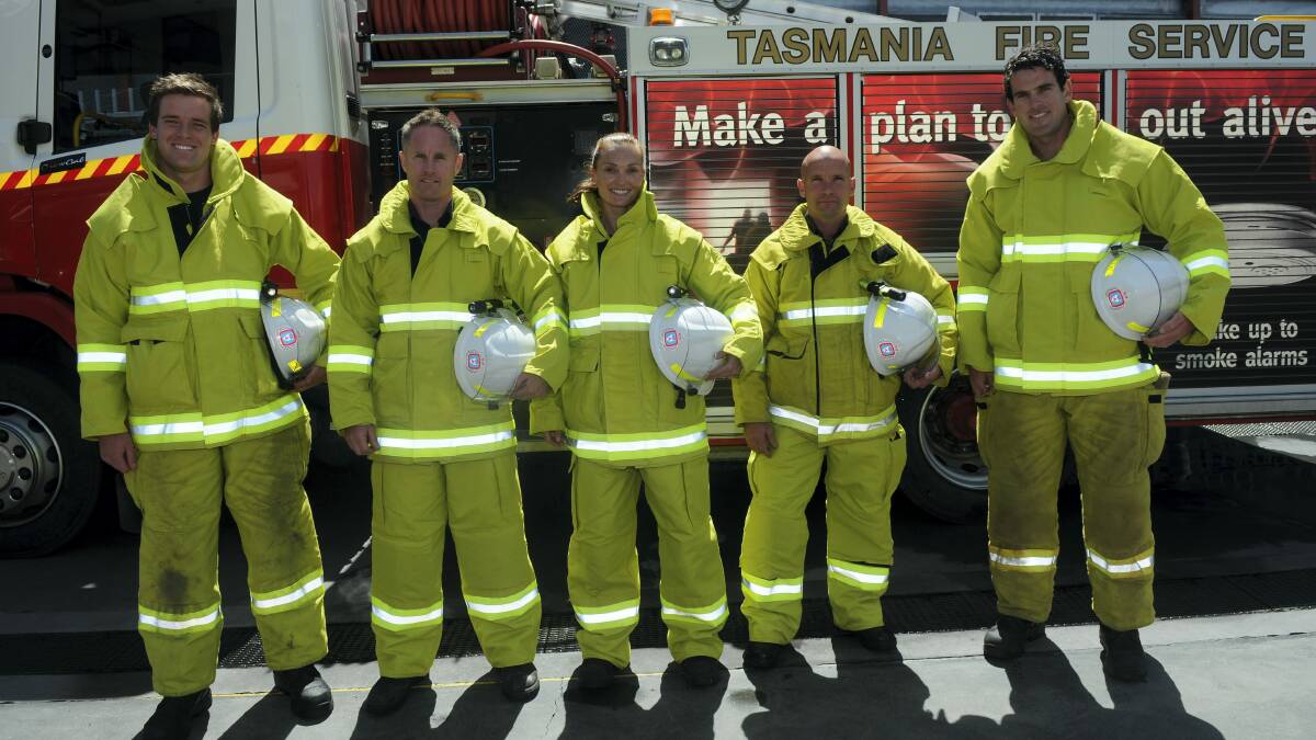 New Launceston Tasmania Fire Service recruits Adam Stacey, Scott Hunter, Laura McCaughey, Scott Meech, Luke Bateman are all kitted out and ready to do their bit.  Picture: PAUL SCAMBLER
