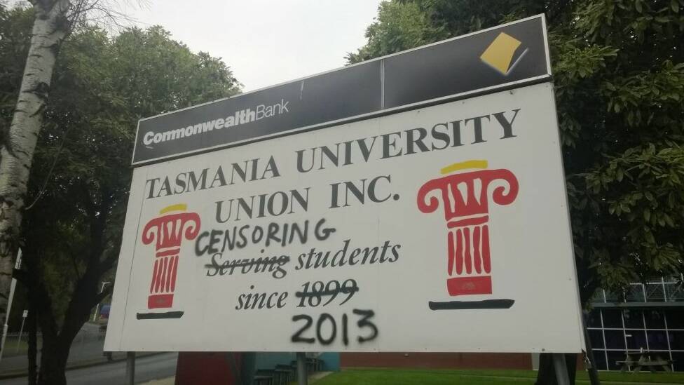 A defaced union sign at the university's Sandy Bay campus.