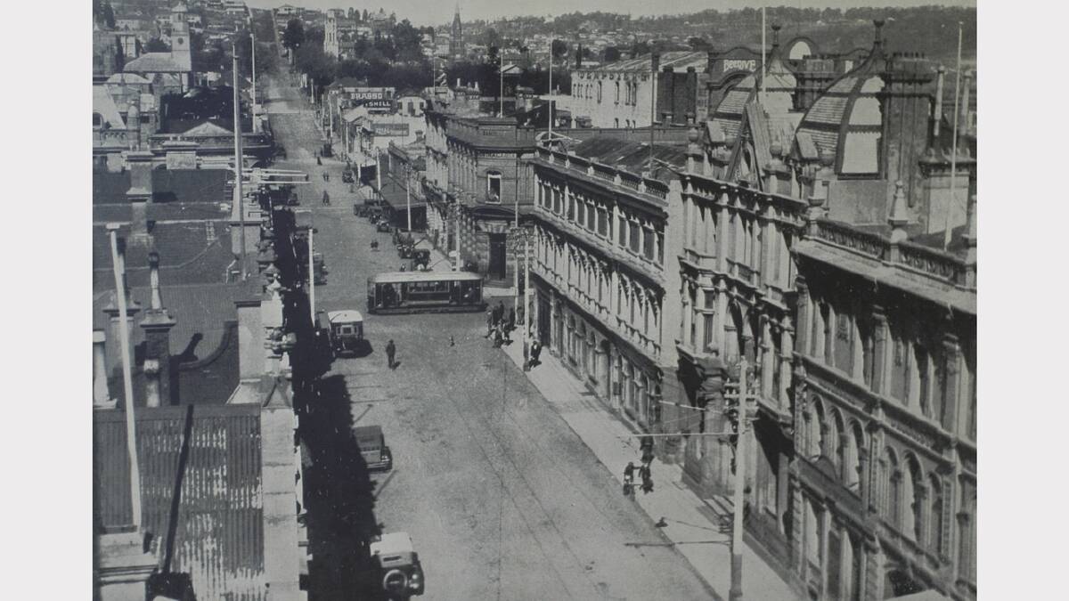 A view of St John Street looking south. In the distance three church spires can be seen - St John's, Chalmers and Christ Church. The Weekly Courier, September 28, 1927.