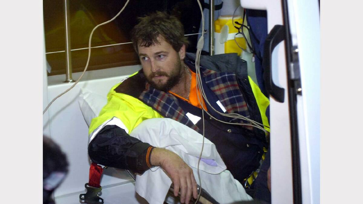 Todd Russell in the back of the ambulance on his way to the LGH after his rescue