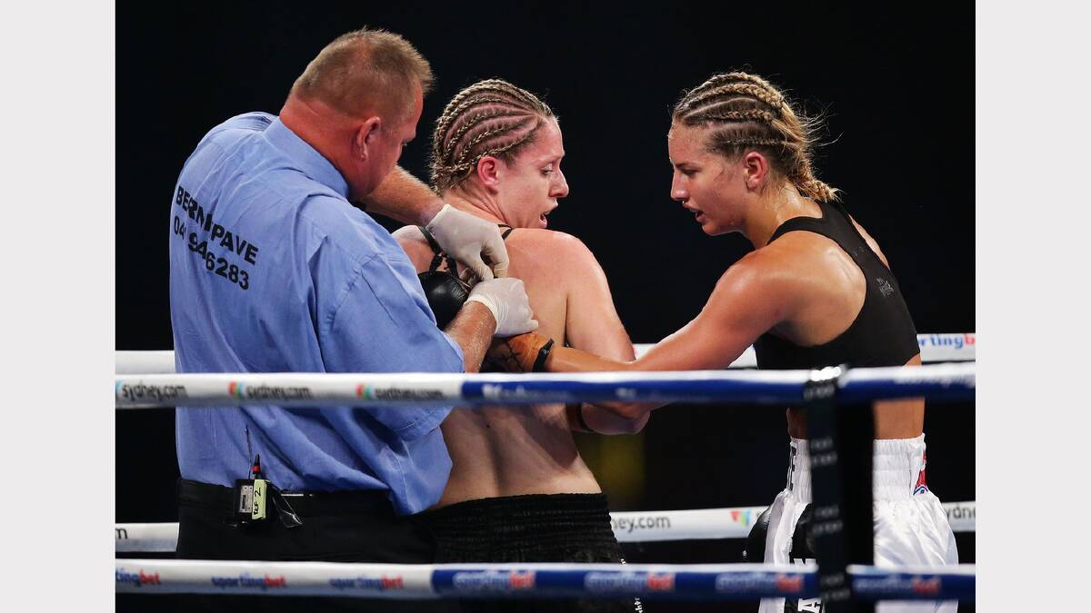  Lauryn Eagle fights Nadine Browne during the Australian Female Lightweight Title bout at Sydney Entertainment Centre.