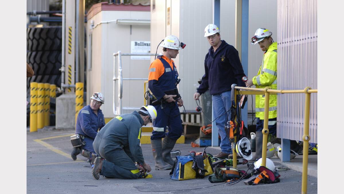 Rescue workers prepare to travel the the Beaconsfield Mine accident site.	