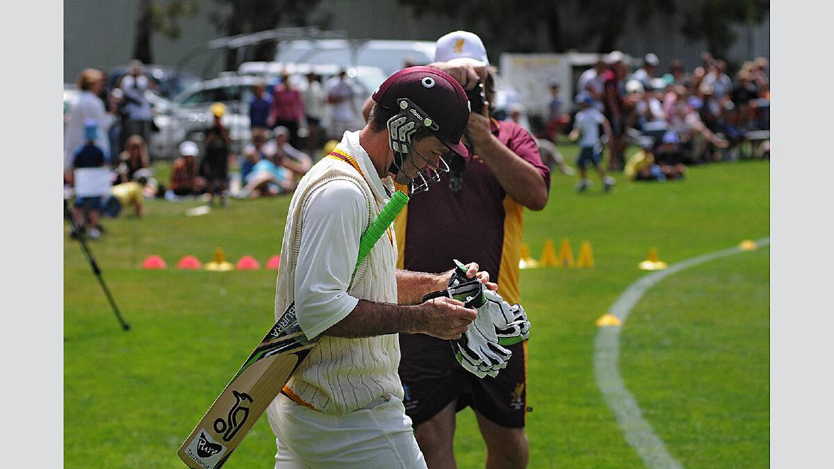 Saturday February 2 2013  photo:  Phillip Biggs Mowbray vs Launceston at Inveresk with Ricky Ponting batting fourth for Mowbray: Ricky Ponting dons helmet and gloves and heads for the crease