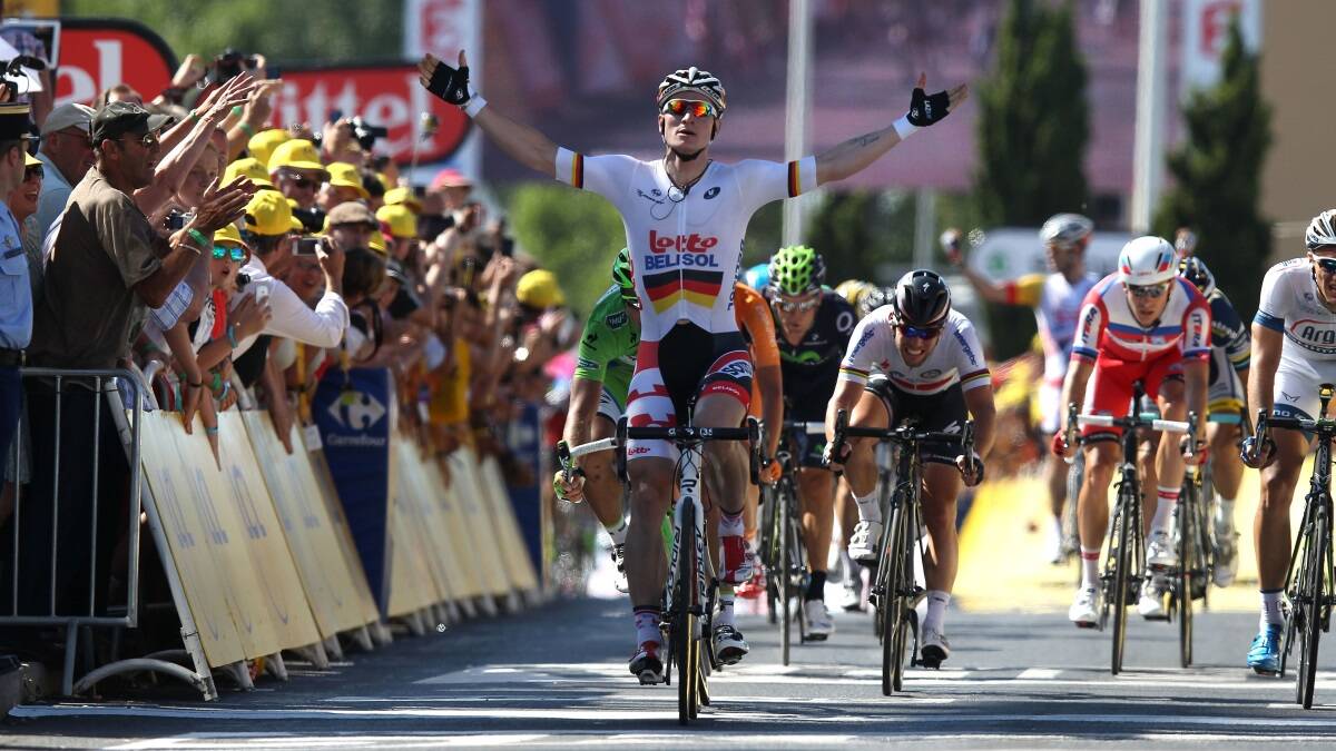 Andre Greipel of Germany and Lotto-Belisol crosses the line to win stage six of the 2013 Tour de France