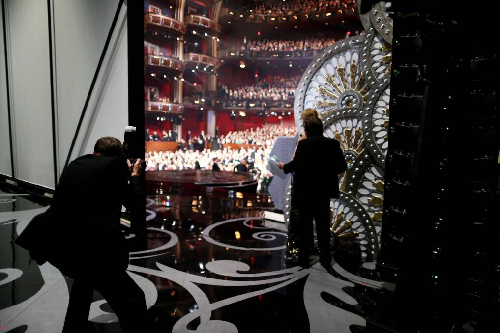 Scenes from backstage of the 2013 Academy Awards. Photo: Getty Images
