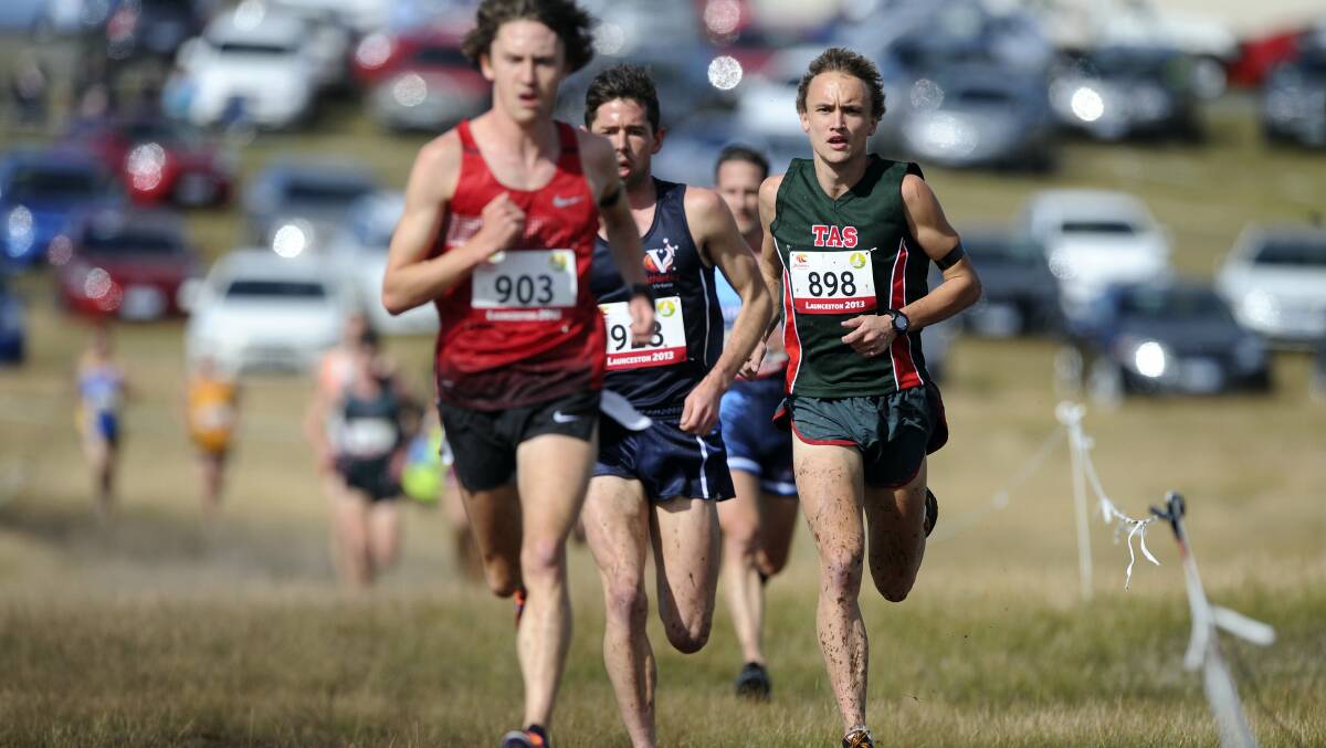 Tasmania's Josh Harris, in green, competing in the recent national cross-country titles at Symmons Plains.  Picture WILL SWAN