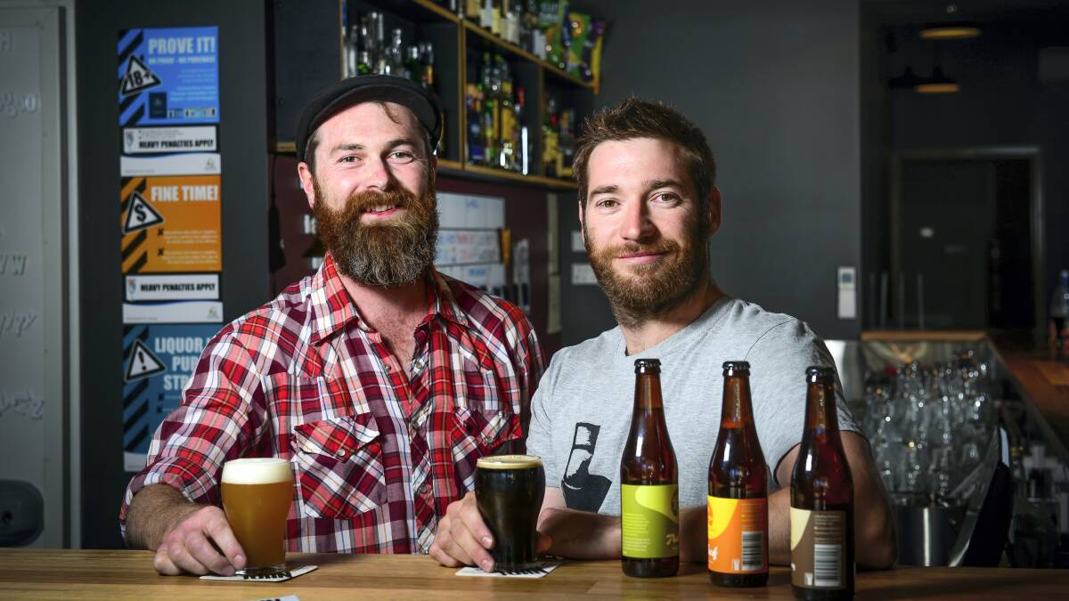Saint John Craft Beer bar manager Luke Dempsey and owner Ryan Campling. Picture: PHILLIP BIGGS