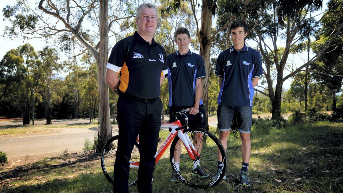 World Tour Academy coach James Victor with Campbell Flakemore, of Hobart, and Alex Clements, of Launceston, at the Tasmanian Institute of Sport this week. Picture: GEOFF ROBSON