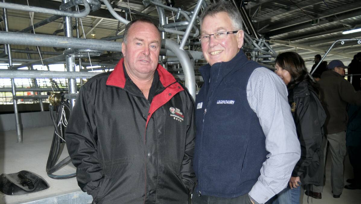 Ringarooma dairy farmer John Williams and DairyTas executive officer Mark Smith at the Old Waterhouse Road dairy conversion launch in July.