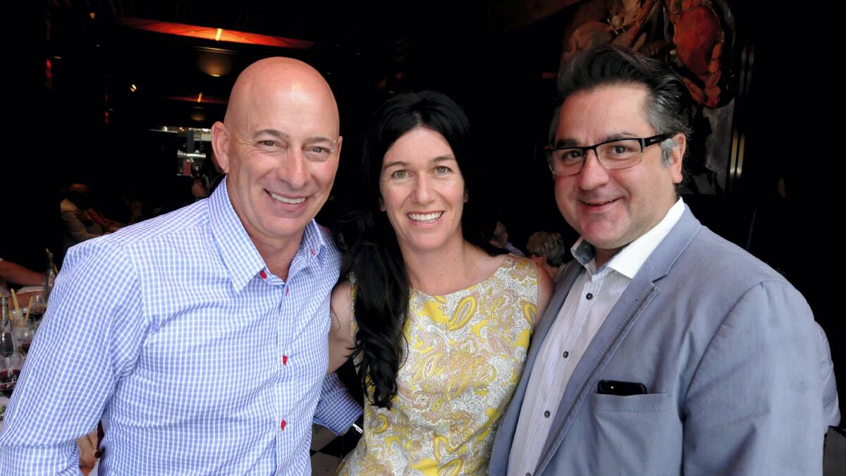 Craig Pearce, from Flying Colours, Natasha Nieuwhof, from Goaty Hill Vineyard, and juggernaut chef Guy Grossi at the Festivale lunch. Picture: GEOFF ROBSON