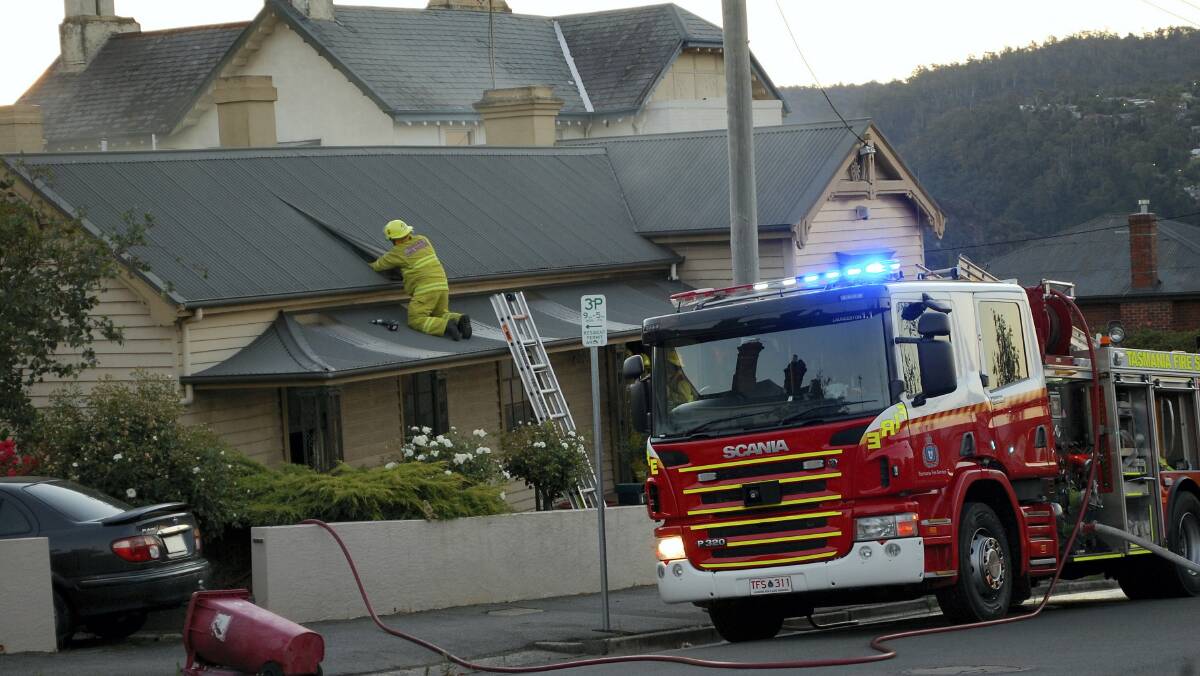 Fire, police and ambulance crews attended a house fire in Arthur Street, East Launceston, about 8.20 last night. Police said the blaze was accidental and that the house had minor smoke damage. A woman was treated at the scene for smoke inhalation.